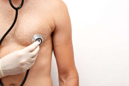 doctor auscultating a patientの写真素材