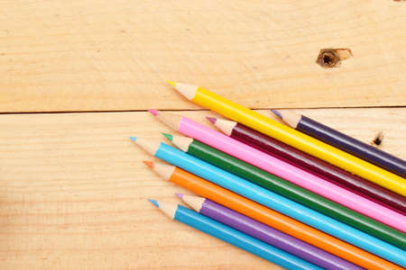 Colored pencils on woodの写真素材