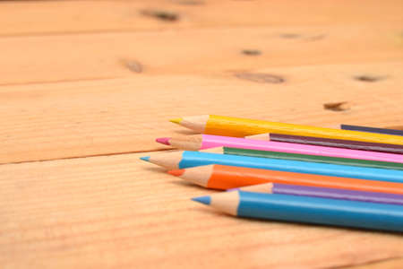 Colored pencils on woodの写真素材