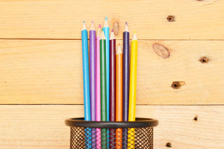 Colored pencils on woodの写真素材