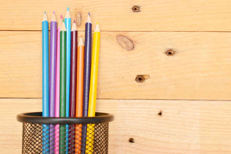 Colored pencils on woodの写真素材