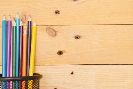 Colored pencils on woodの写真素材
