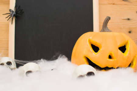 Halloween pumpkin and blackboardの写真素材