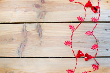 Christmas Bells on woodの写真素材