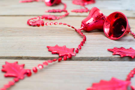 Christmas Bells on woodの写真素材