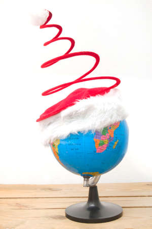 World globe with a Christmas capの写真素材