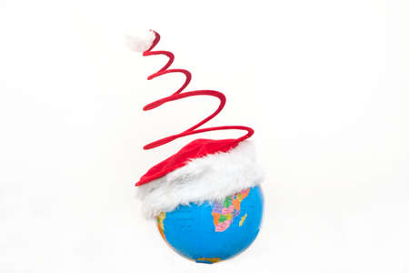 World globe with a Christmas capの写真素材