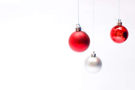Two Christmas balls hangingの写真素材