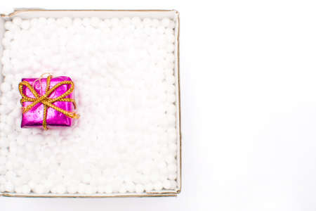 Gift box with a gift insideの写真素材