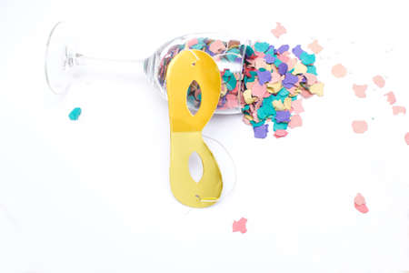 Confetti in a glass and maskの写真素材