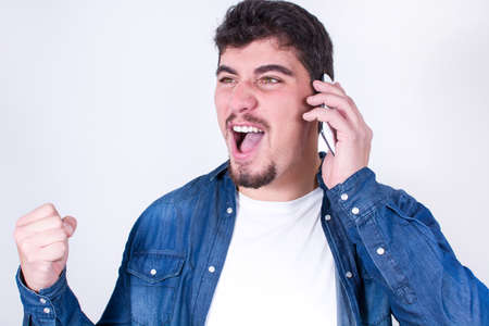 handsome screaming  on phone