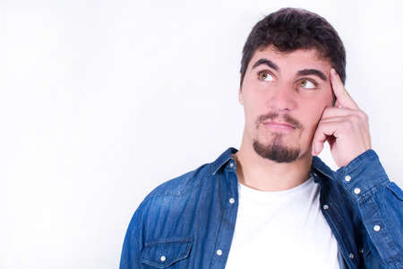 handsome man thinkingの写真素材