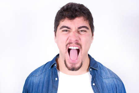 Young man screamingの写真素材