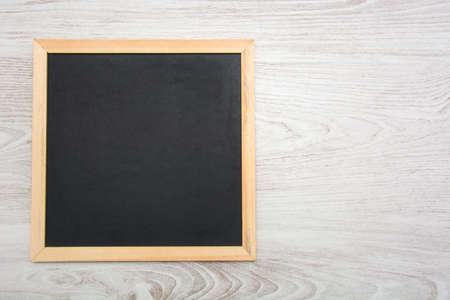 blackboard on woodの写真素材