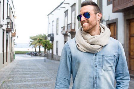 Man walking down the streetの写真素材