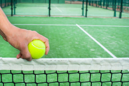 man playing paddle tennisの写真素材