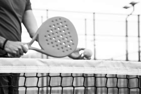 man playing paddle tennisの写真素材