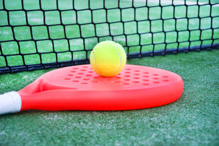 paddle tennis racket and ballの写真素材