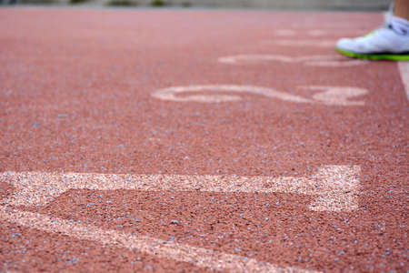 Runners at the start of the track