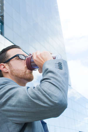 businessman drinking coffeeの写真素材