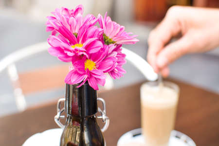 drinking coffee on a terraceの写真素材