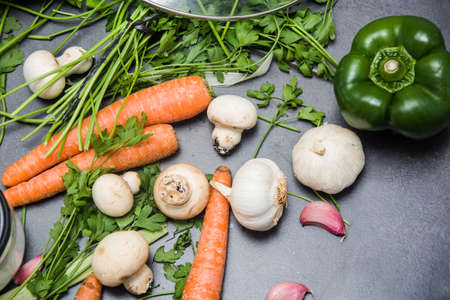 Vegetables on slate tableの写真素材