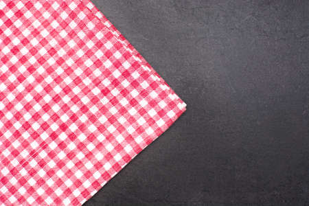 Checkered tablecloth on slate table
