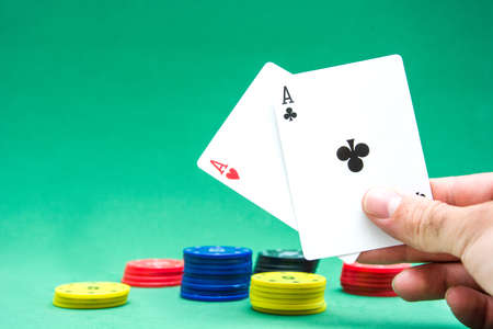 Man showing poker cards