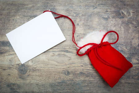 Christmas bag with white cardの写真素材