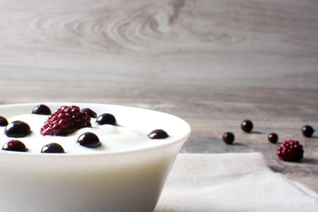 Breakfast with yogurt and fruitの写真素材