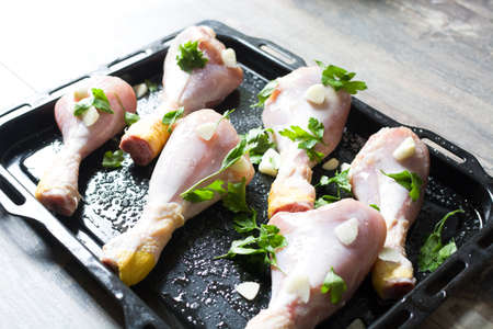 Chicken with garlic and parsleyの写真素材