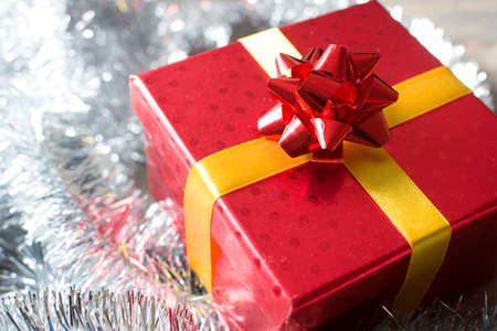 Red Christmas gift and garlandの写真素材