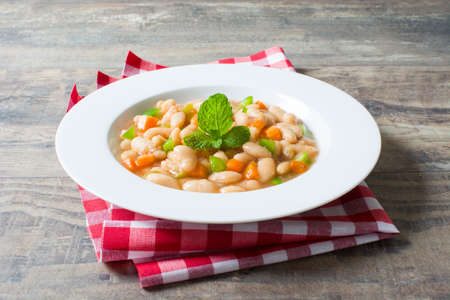 white beans with carrot and green pepperの写真素材