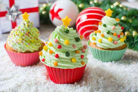 Christmas tree cupcakes and Christmas decorationの写真素材