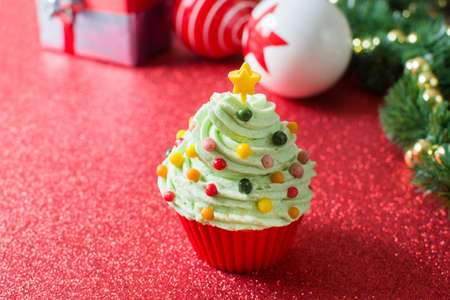 Christmas tree cupcake and Christmas decorationの写真素材