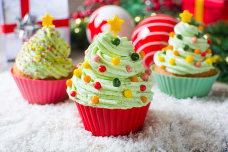 Christmas tree cupcakes and Christmas decorationの写真素材
