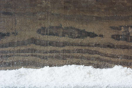 Snow and wood backgroundの写真素材