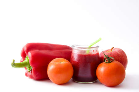 Red detox with beetroot, pepper,apple and tomato. Isolated studioの写真素材