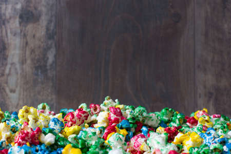 Sweet popcorn and wood backgroundの写真素材