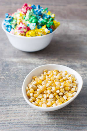 Sweet popcorn and wood backgroundの写真素材