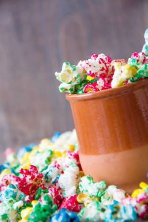 Sweet popcorn on woodの写真素材