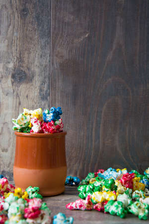 Sweet popcorn on woodの写真素材