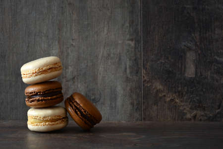 Macarons on a rustic woodの写真素材