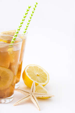 Ice tea with lemon. White backgroundの写真素材