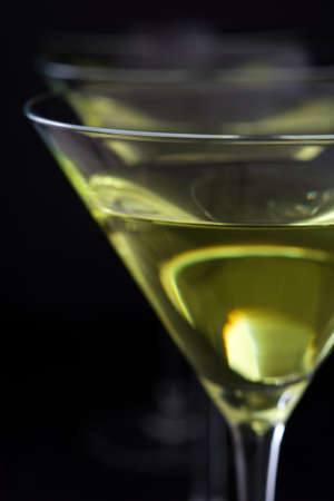 Green apple cocktail on black stone backgroundの写真素材
