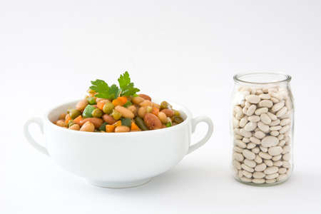 White beans with vegetables in a bowl. isolatedの写真素材