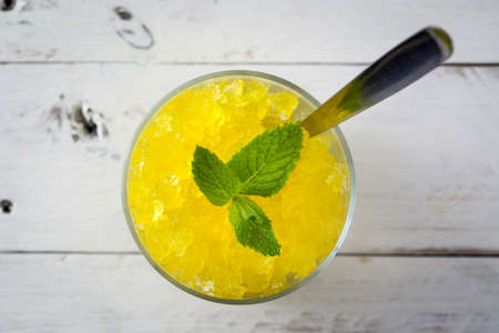 Lemon slushies on white woodの写真素材