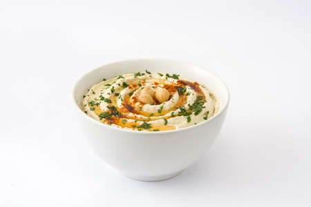 Hummus in bowl isolated on white backgroundの写真素材