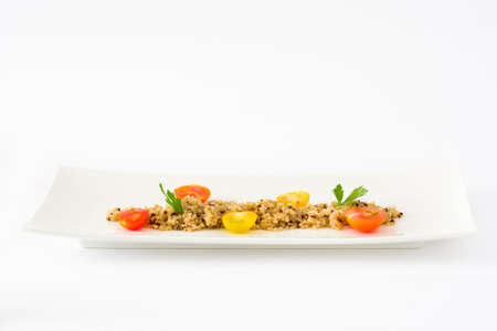 Quinoa, tomatoes and spinach isolated on whiteの写真素材