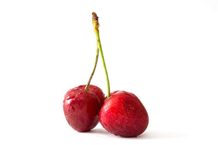 Delicious cherries isolated on white background